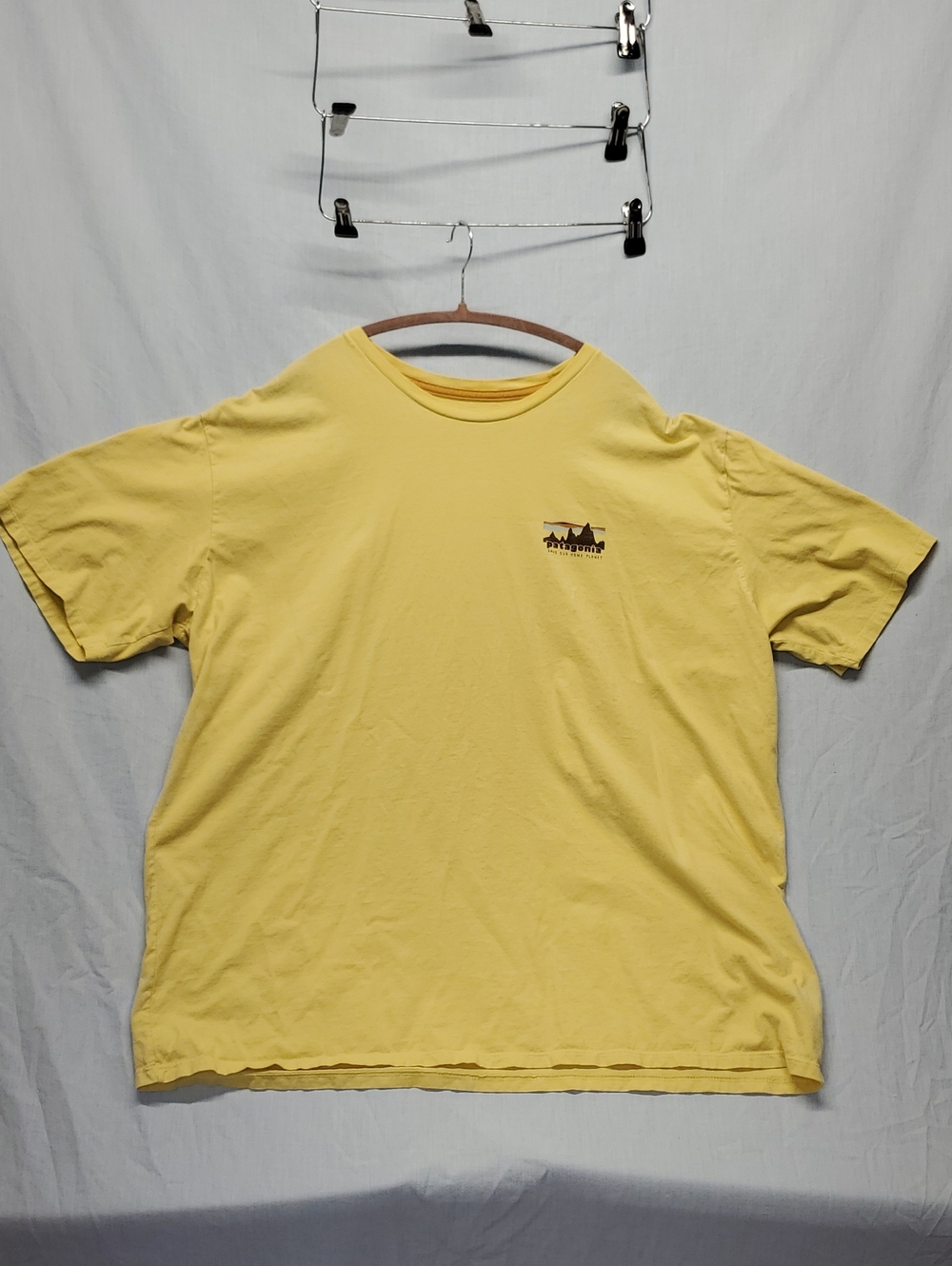Patagonia Pale Yellow Short Sleeve Tee with Small Chest Graphic #321
